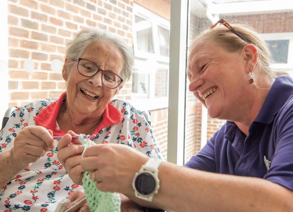 Carer activities with resident.